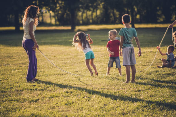 istock Group of children playing in public park 1091049668