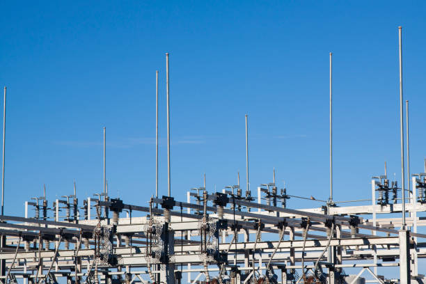 detailed view of electrical substation with blue sky