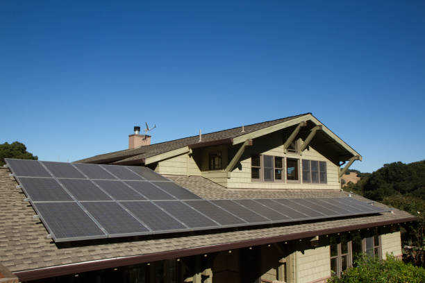 solar panels on roof of house stock photo