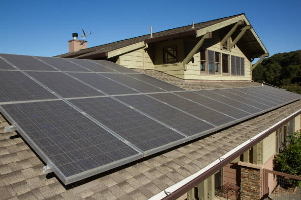 solar panels on roof of house stock photo