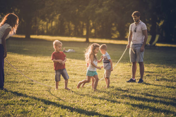 istock Group of children playing in public park 1091049944