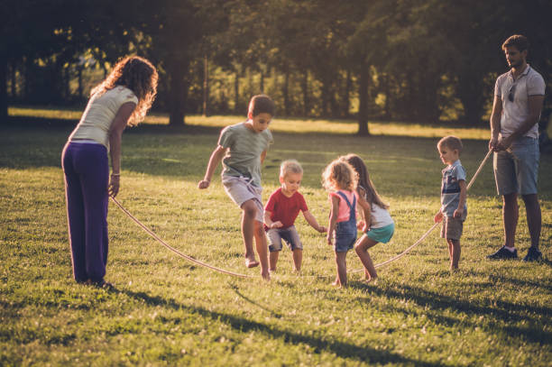 istock Group of children playing in public park 1091050520