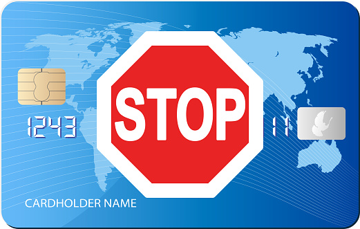 road sign STOP on credit card