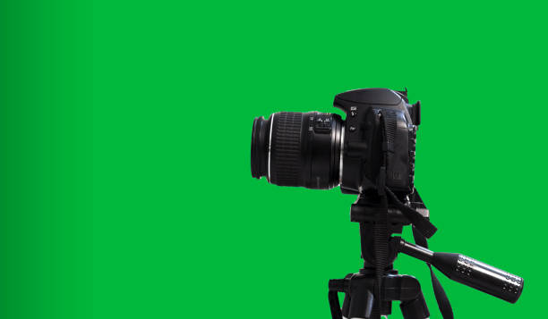 istock tripod on dslr camera and isolated green background 1091059020