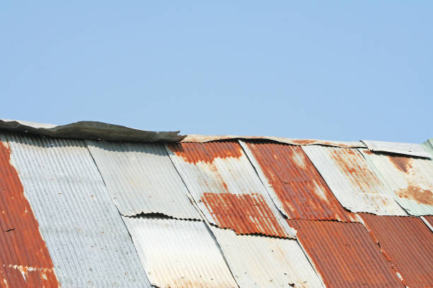istock Wooden house with rusty zinc roof 1091060494