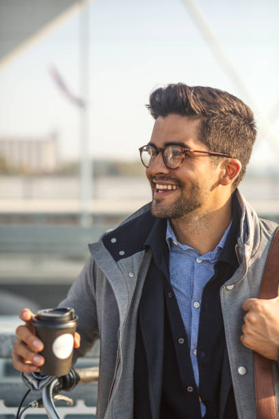 istock Businessman drinking coffee to go 1091060910