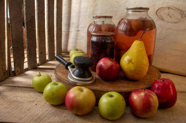 istock Home-made canned compote and fresh fruit on the basement shelf still life 1091061006