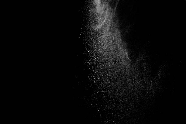 istock Freeze motion of white particles on black background. 1091061146