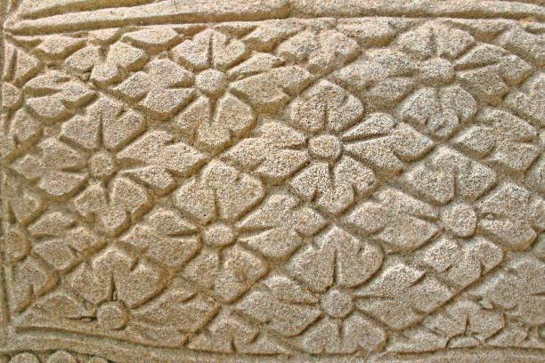 istock Flowers carving on stone statue 1091063798
