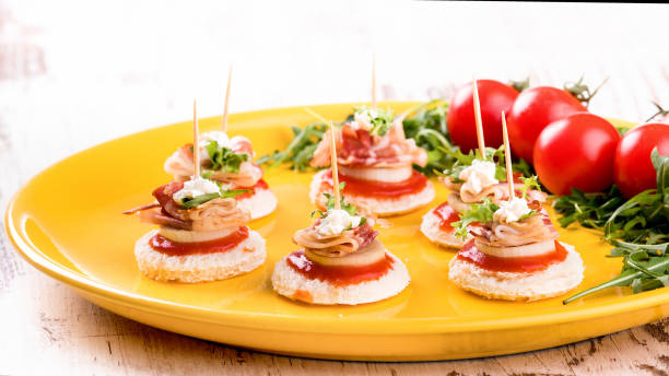 istock Canapes with bacon and tomato 1091064046