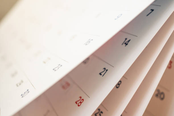 istock Abstract blur calendar page flipping sheet close up background 1091081406