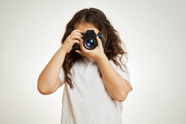 istock Young Girl Photographer 1091086802