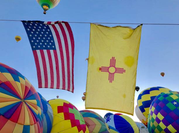 A beautiful hot air balloon floating in the sky on a lovey summer evening.