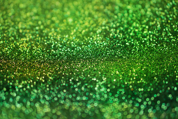 istock colorful glowing green glitters texture background for decorative concept 1091106294