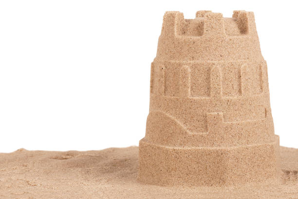 istock Close up on a sand castle on the beach, isolated on white background. 1091108936