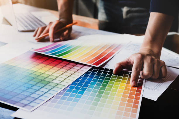 istock corporate designer graphic creative creativity concept ,man using pen to create graphic design coloring colour ideas style house to order customer. 1091132030