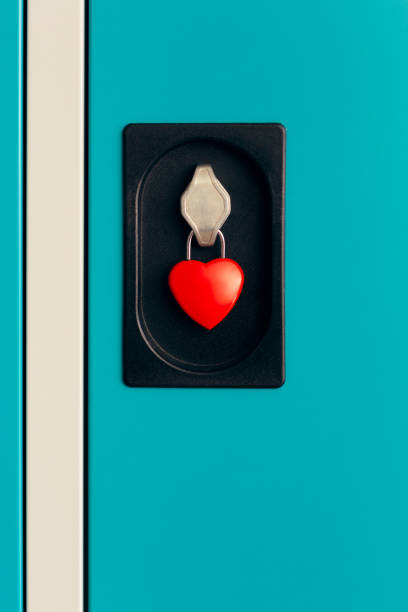 istock Close-up of a Heart Shaped Padlock Keeping Locker Closed 1091146468