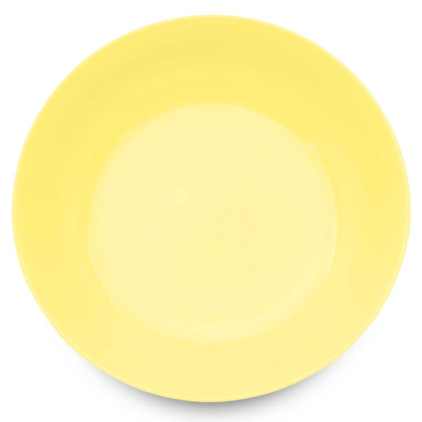 istock Yellow plate isolated on white background. 1091163856