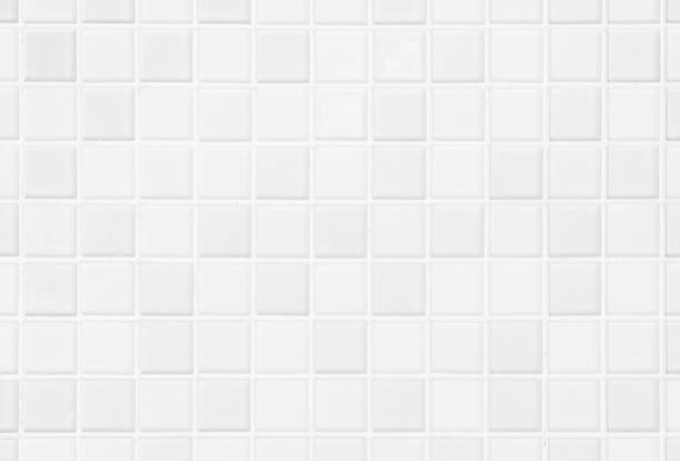 istock White or gray ceramic wall and floor tiles abstract background. Design geometric mosaic texture for the decoration of the bedroom. Simple seamless pattern for backdrop advertising banner poster or web 1091165372