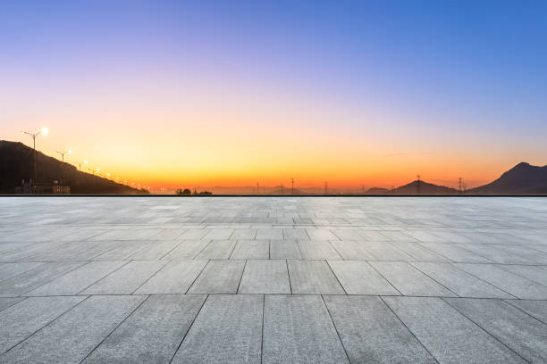 istock Square floor and mountain silhouette at beautiful sunset 1091167520