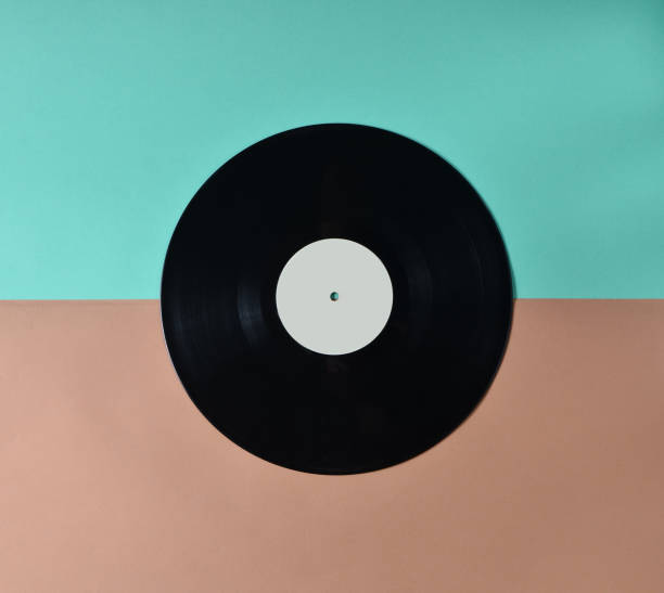 istock Vinyl plate on a colored pastel background, retro music technology, top view, minimalism 1091186636