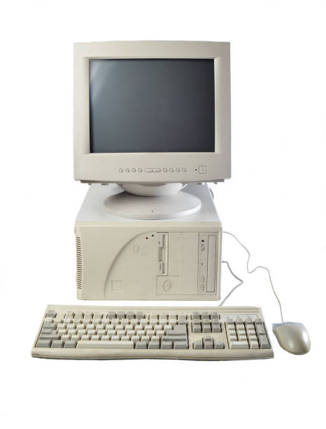 istock Retro stationary computer isolated on white background. Monitor, system unit, computer mouse. Obsolete Technologies 1091188988