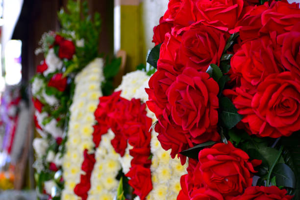 istock Funeral Roses and Standing Sprays 1091189858