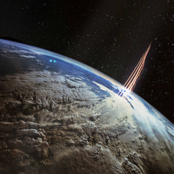 Missile launch, satellite view with planet Earth and galaxy stars. The elements of this image furnished by NASA.