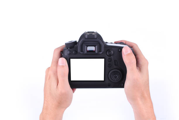 istock Hands holding the DSLR Camera on white background 1091204768