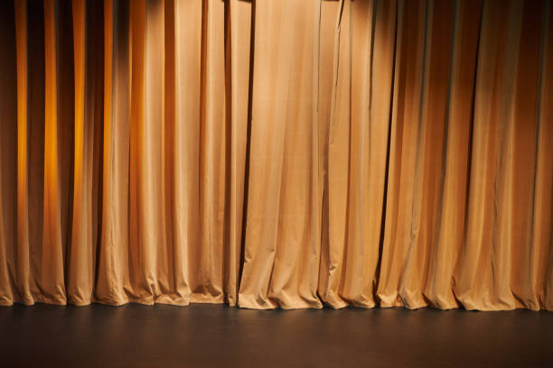 istock Brown curtains of a theater as background. 1091211098
