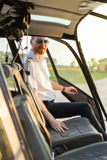 Helicopter pilot entering vehicle