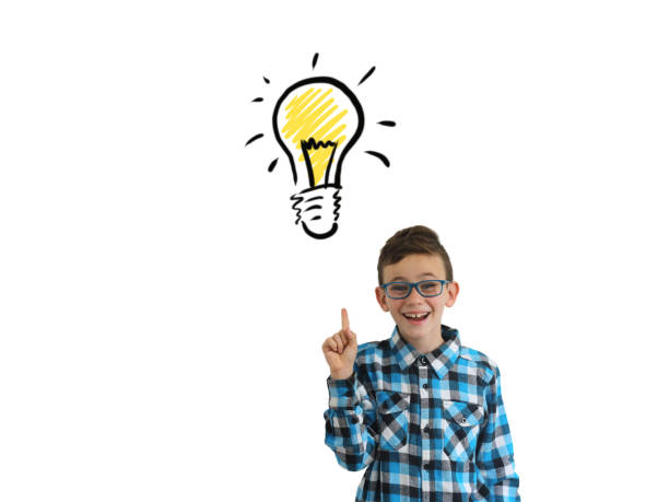 istock Young boy child think creative bright idea light bulb innovation pointing isolated 1091220182