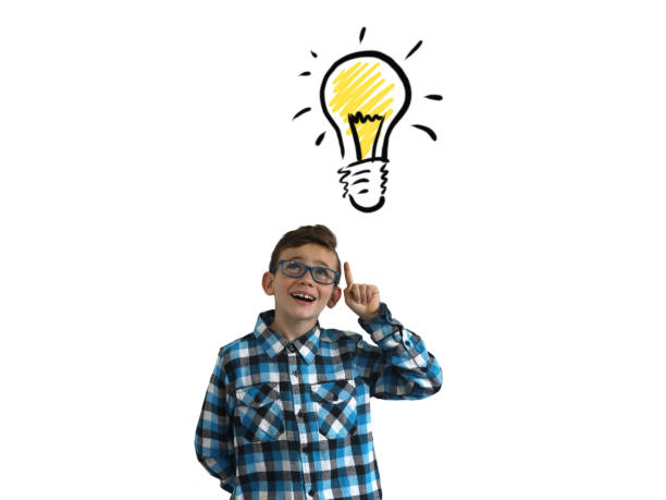 istock Young boy child think creative bright idea light bulb innovation pointing isolated 1091220270