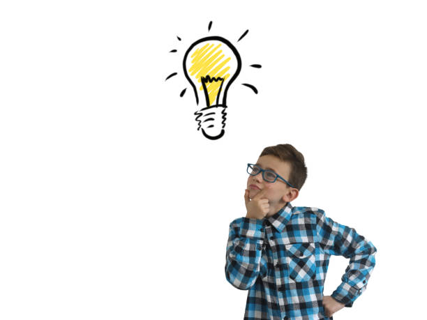 istock Young boy child think decision choice idea light bulb innovation isolated 1091220598