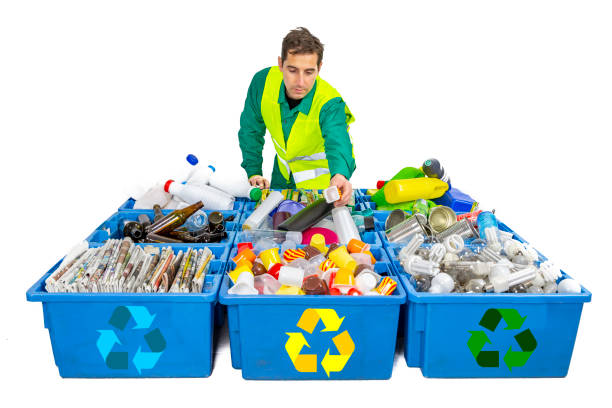 istock Garbage bins for recycling with a man trash. 1091220732