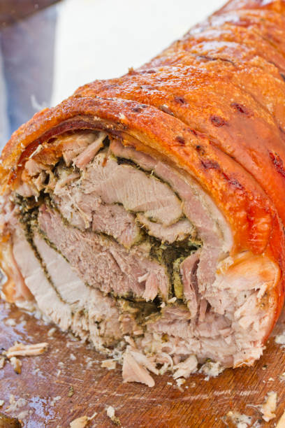 istock Roasted pork roll. BBQ pork roll baked with spices 1091222308
