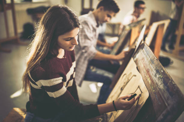istock Female art student drawing a painting at art studio. 1091230862