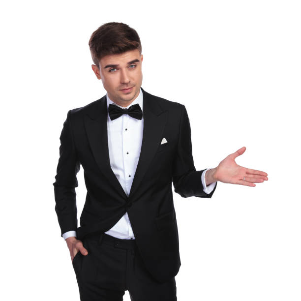istock portrait of relaxed groom presenting to side while standing 1091232966