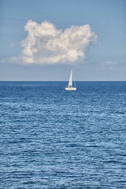 istock Lonely yacht on the horizon. 1091234202