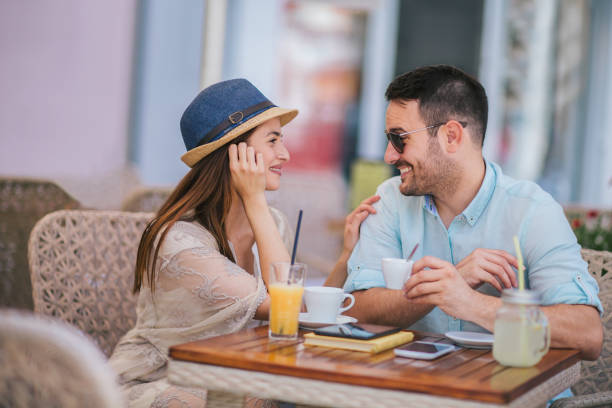 istock Beautiful couple having coffee on a date 1091236904