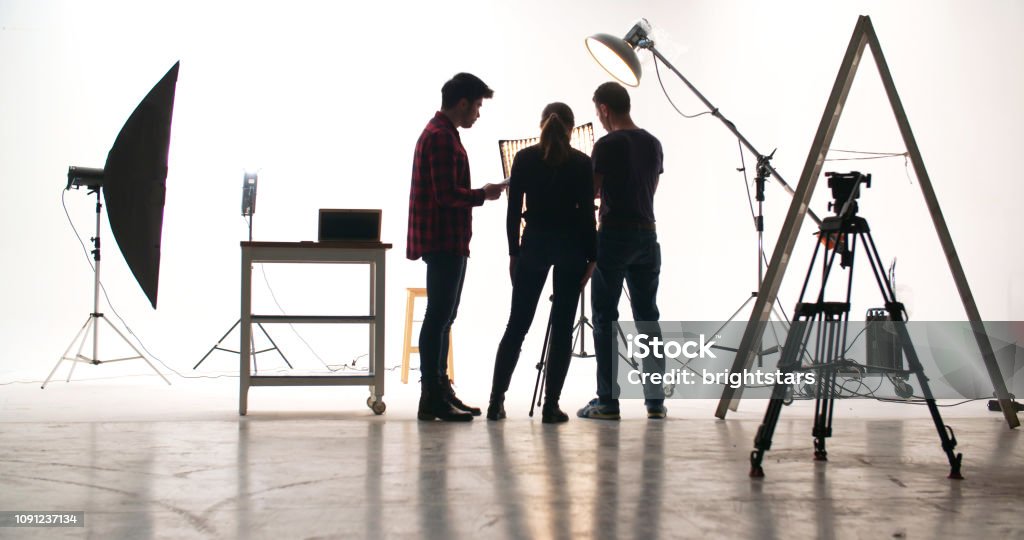 Film crew in the studio Film crew in the studio. Film Set Stock Photo
