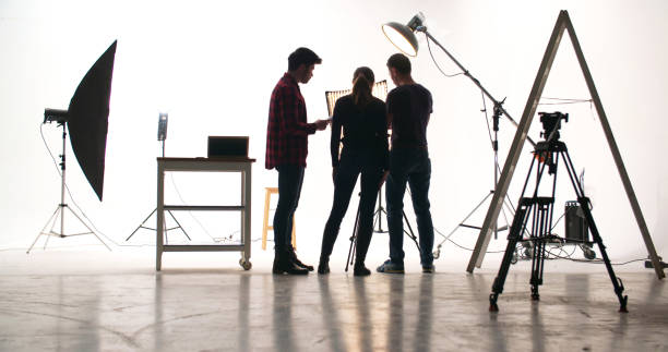 Film crew in the studio stock photo