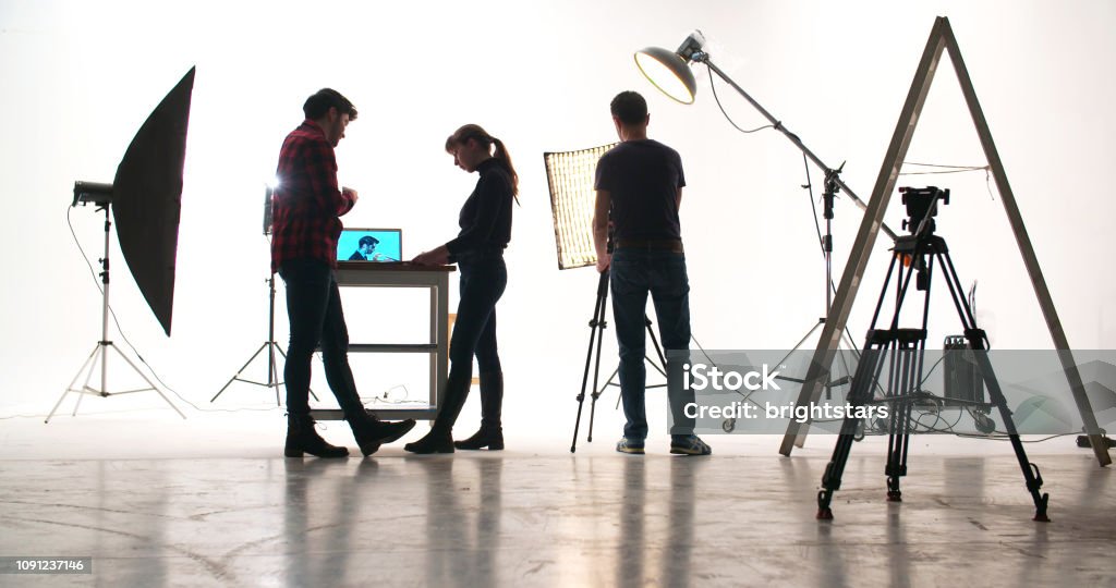 Film crew in the studio Film crew in the studio. Studio Shot Stock Photo