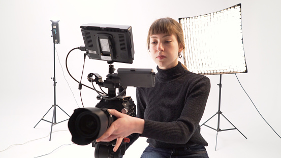 Young female camera operator.