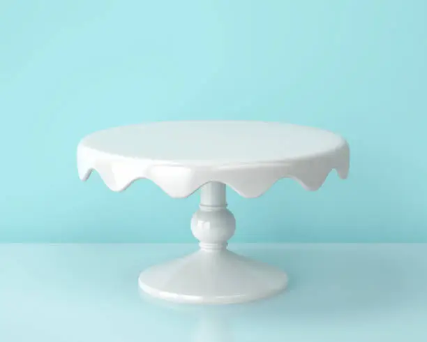 White porcelain cake stand on blue backgroung. 3D rendering