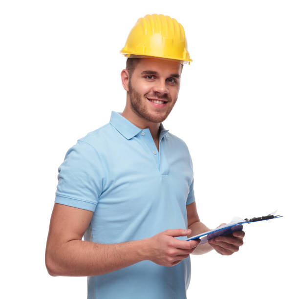 portrait of young engineer student holding blue clipboard