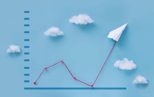 istock Conceptual paper plane pulling business finance growth chart still life image. 1091245836