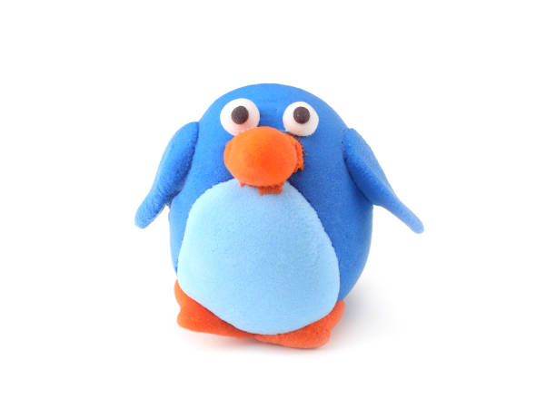 istock Kid's modelling clay penguin isolated on white background 1091262852