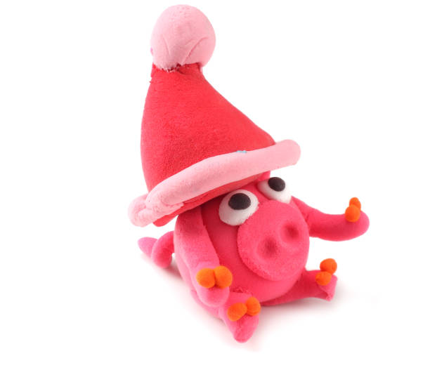 istock Kid's modelling clay pig isolated on white background 1091263038