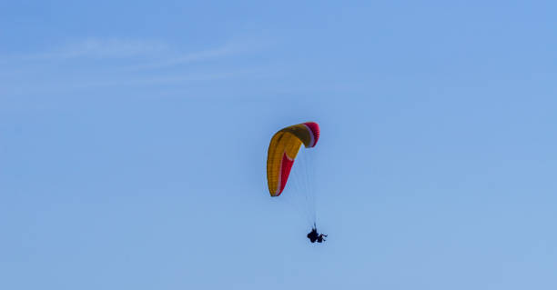 istock Paraglider flying in the sky free time spent actively wonderful experiences vacation 1091264754